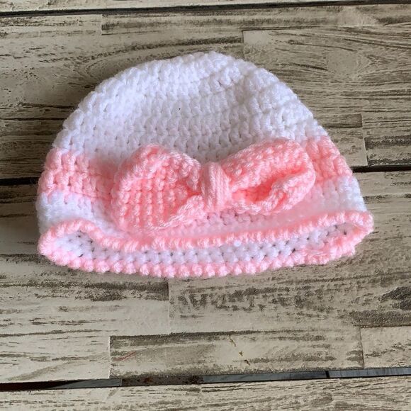 5/$25 
Homemade Knit Pink and White Bow Hat - Picture 1 of 3